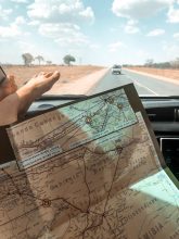 person holding direction map of namibia